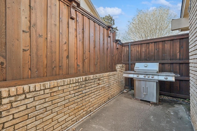 view of patio / terrace featuring a grill