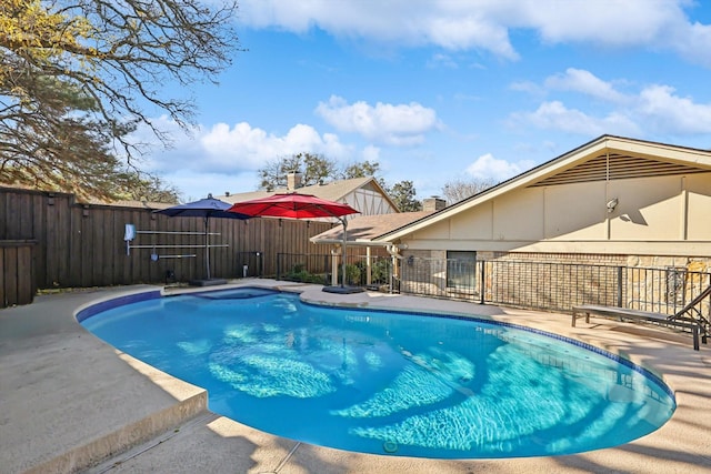 view of pool featuring a patio area