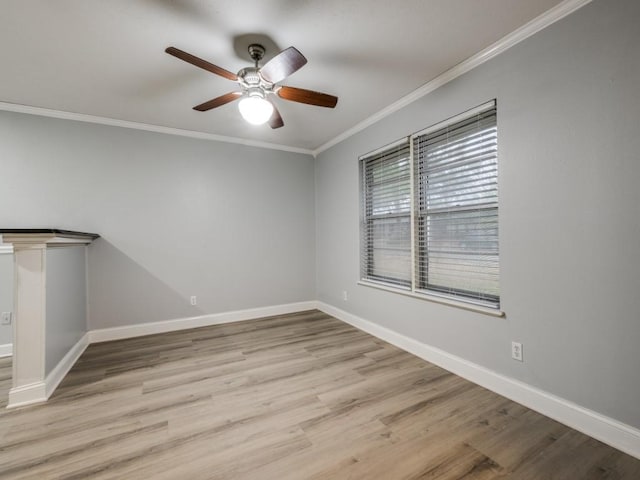 unfurnished room with crown molding, ceiling fan, and light wood-type flooring