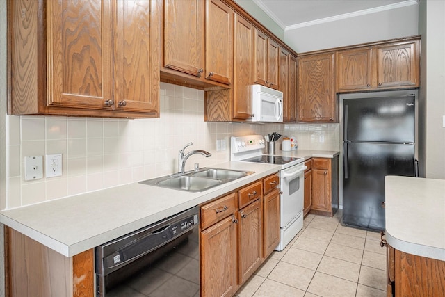 kitchen with sink, crown molding, black appliances, light tile patterned flooring, and decorative backsplash