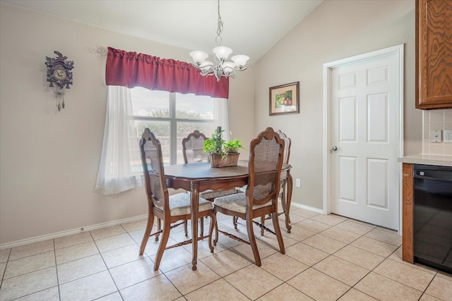 dining room with lofted ceiling, light tile patterned floors, and a notable chandelier