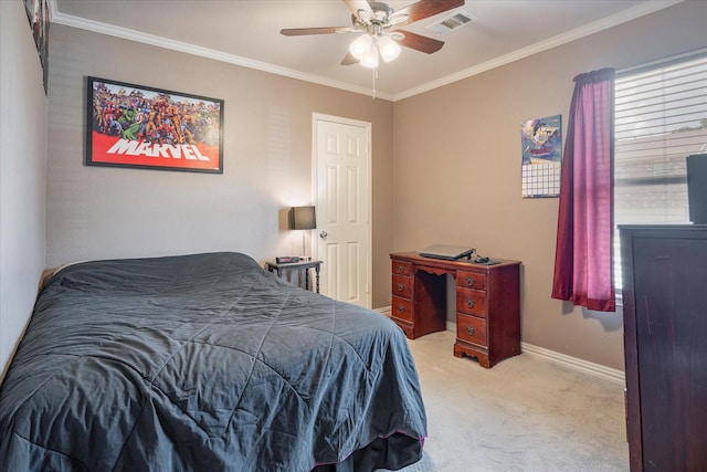 bedroom with ceiling fan, light colored carpet, and ornamental molding