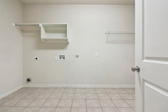 laundry area featuring hookup for a washing machine, hookup for an electric dryer, light tile patterned floors, and hookup for a gas dryer