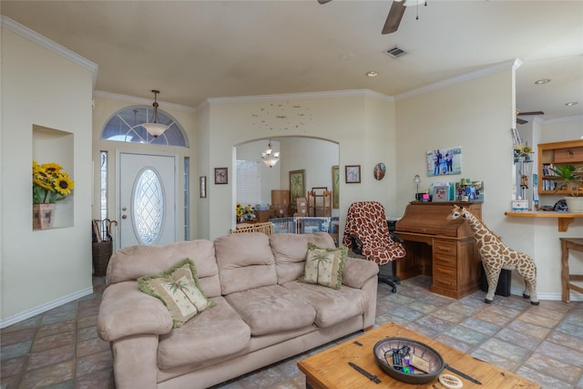 living room with crown molding and ceiling fan