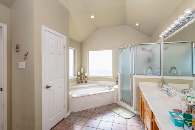 bathroom with vanity, plus walk in shower, tile patterned flooring, and vaulted ceiling