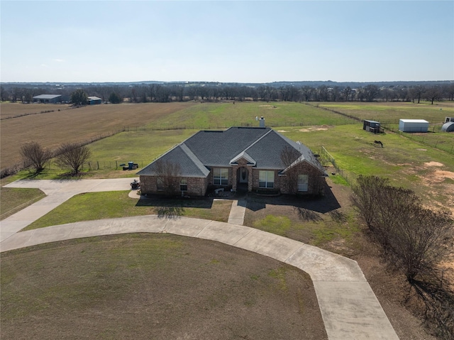 birds eye view of property featuring a rural view