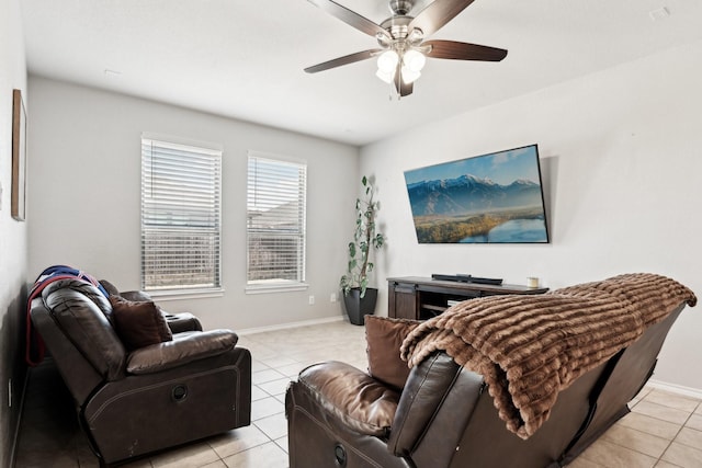 tiled living room featuring ceiling fan