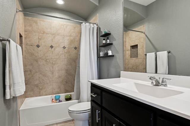 full bathroom featuring vanity, toilet, and shower / bath combo