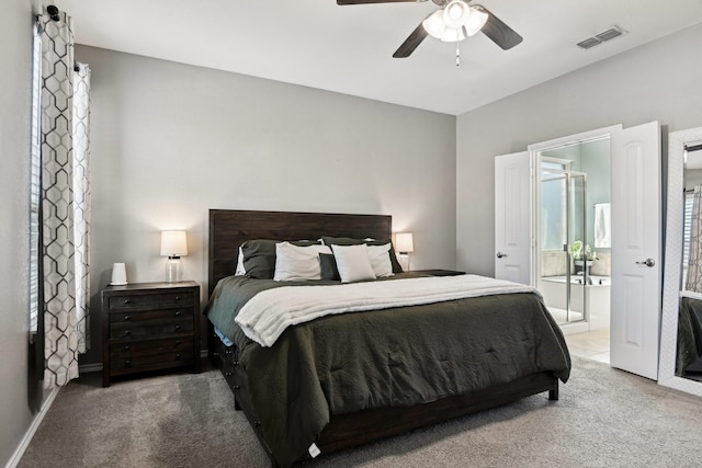 carpeted bedroom featuring ceiling fan and connected bathroom