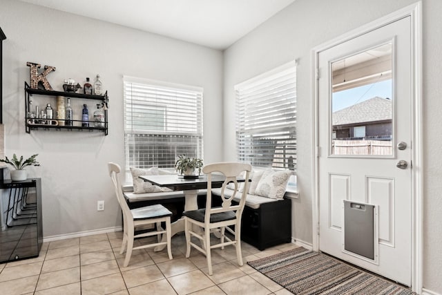 dining room featuring light tile patterned floors