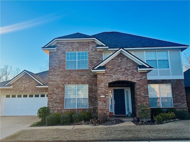 view of front of property with a garage