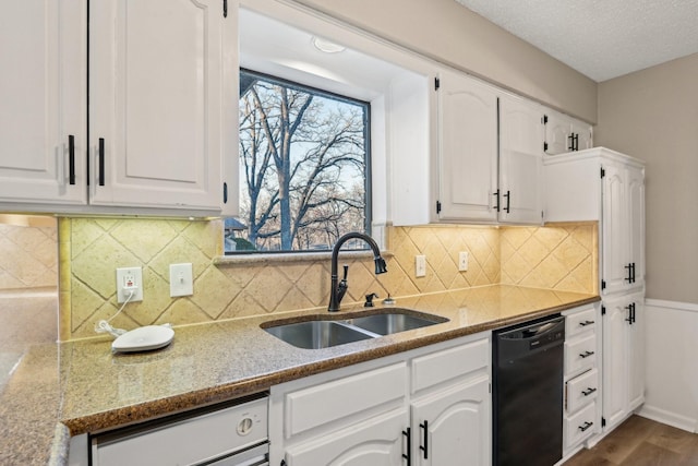 201 Trailwood Dr, Euless, TX 76039 - kitchen with white cabinetry, dishwasher, sink, and tasteful backsplash