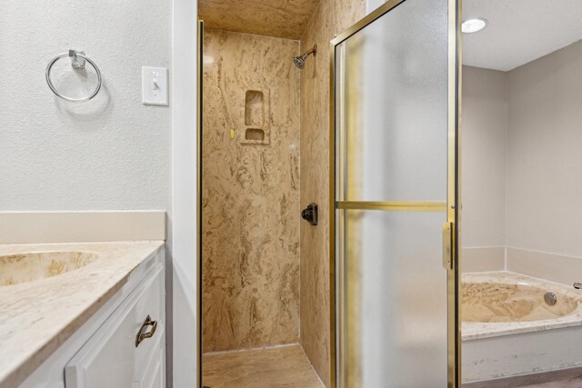 201 Trailwood Dr, Euless, TX 76039 - bathroom featuring vanity and independent shower and bath