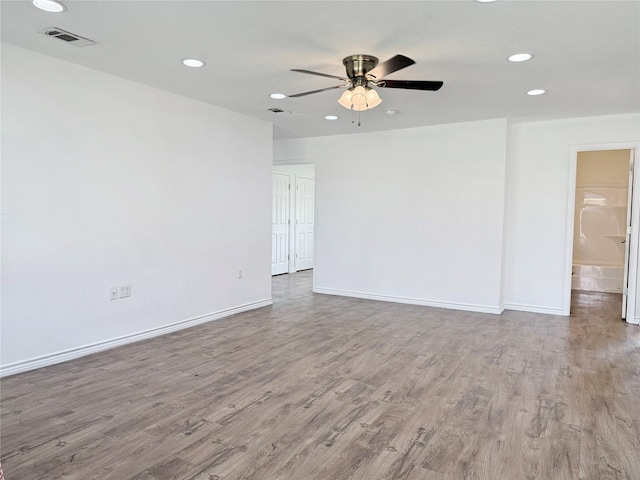 unfurnished room featuring wood-type flooring and ceiling fan