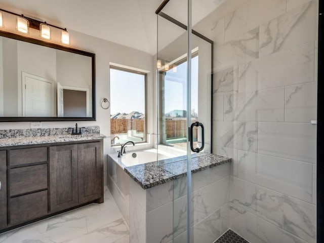 bathroom featuring lofted ceiling, vanity, and plus walk in shower