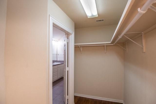 walk in closet featuring visible vents