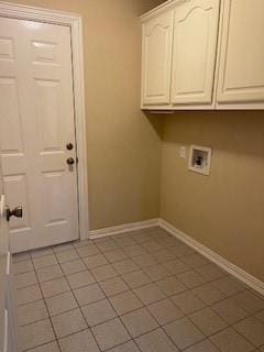 laundry room with cabinet space, hookup for a washing machine, and baseboards