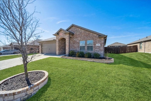 ranch-style house with a garage and a front lawn