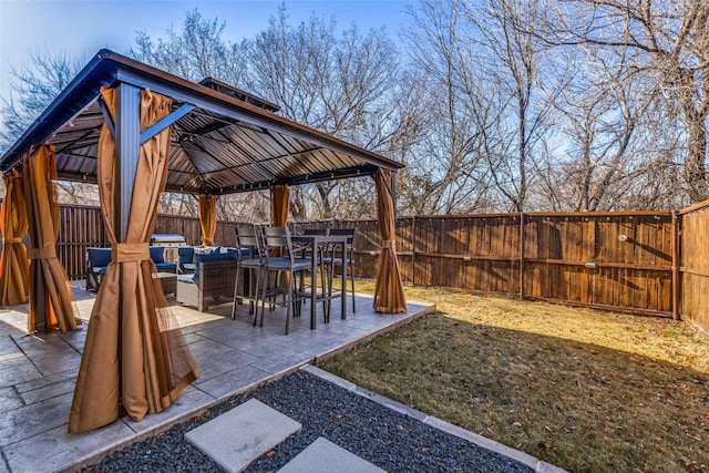 view of yard featuring an outdoor living space, a gazebo, and a patio