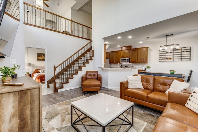 living room with a high ceiling