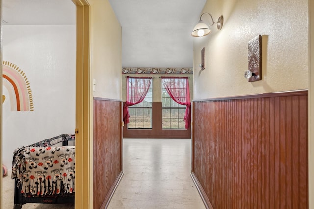 corridor with wood walls