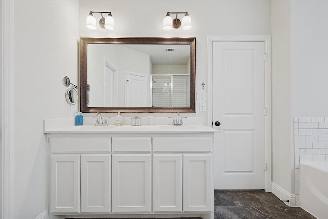 bathroom featuring vanity and shower with separate bathtub