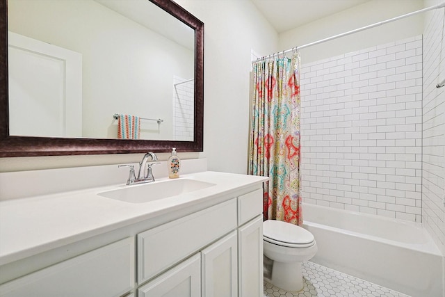 full bathroom featuring tile patterned flooring, vanity, shower / bath combo with shower curtain, and toilet