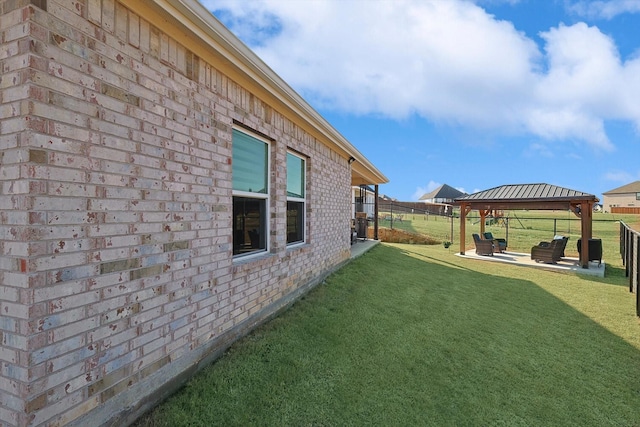 view of yard with a gazebo and a patio