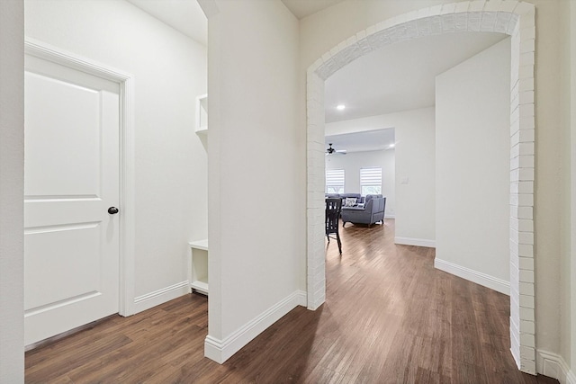 corridor featuring wood-type flooring