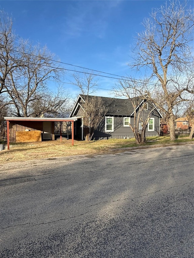 view of front of house with a carport