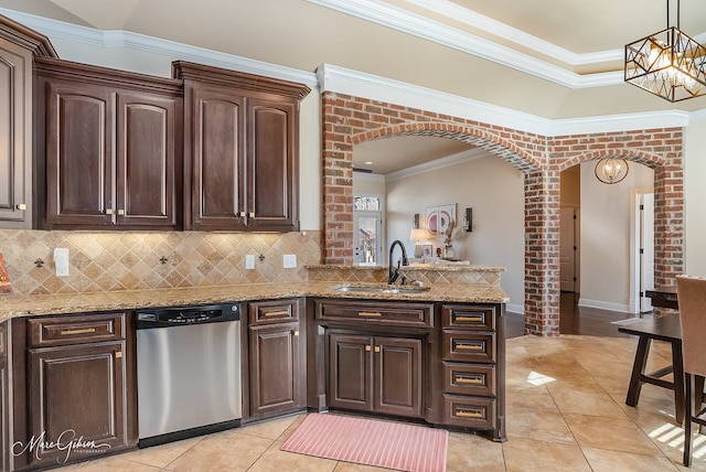 kitchen featuring dishwasher, dark brown cabinets, sink, and crown molding