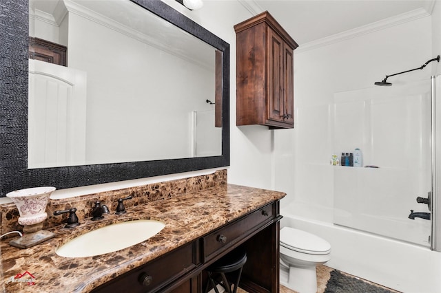 full bathroom with vanity, crown molding, bathtub / shower combination, and toilet