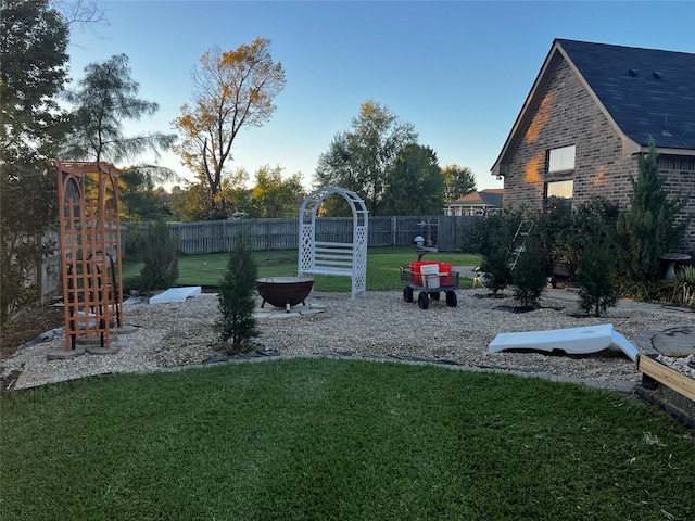 view of yard with a fenced backyard