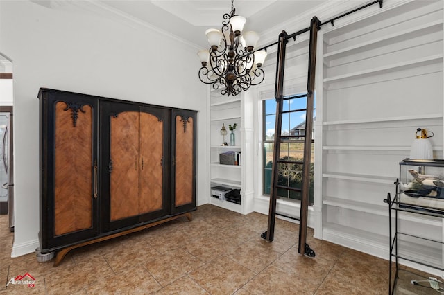 foyer entrance with crown molding, a tray ceiling, and light tile patterned floors