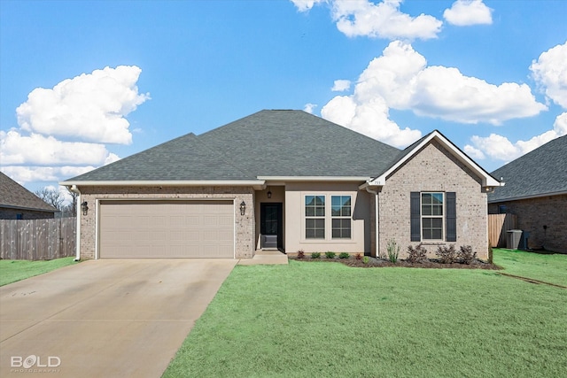 view of front of house with a garage, a front yard, and cooling unit