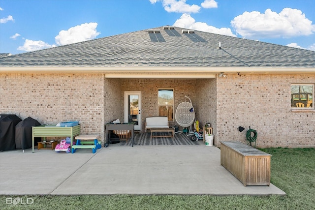 rear view of property with a patio