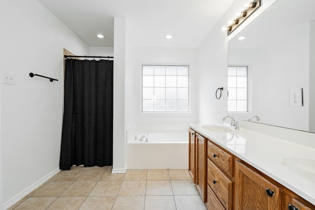 bathroom with tile patterned flooring, vanity, and plus walk in shower