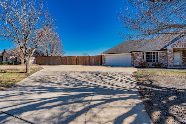 view of side of property with a garage