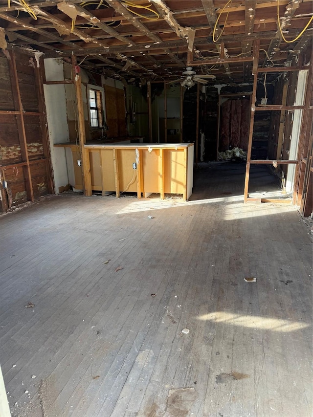 miscellaneous room with wood-type flooring