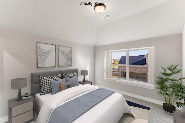 bedroom featuring vaulted ceiling and light carpet