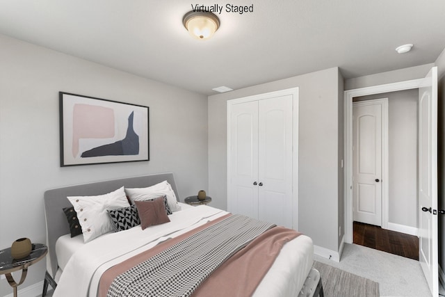 bedroom featuring carpet and a closet