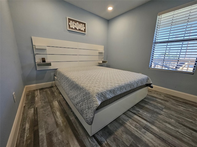 bedroom featuring dark hardwood / wood-style floors