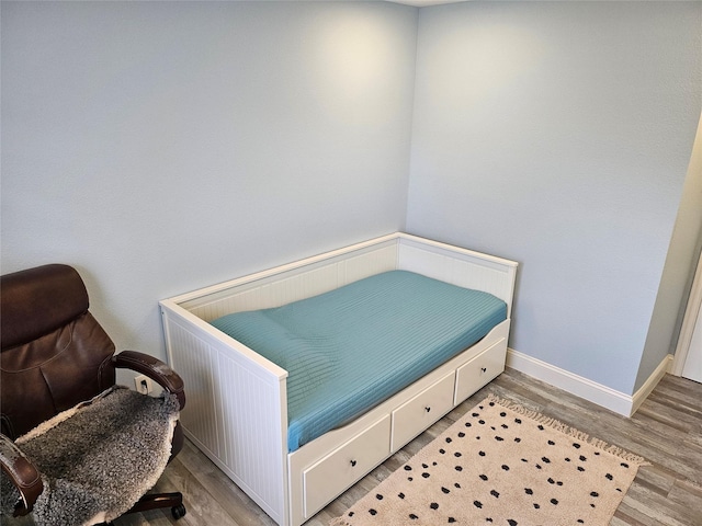 bedroom featuring light hardwood / wood-style floors