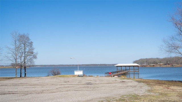 view of dock with a water view