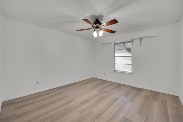 unfurnished room with ceiling fan and light hardwood / wood-style floors