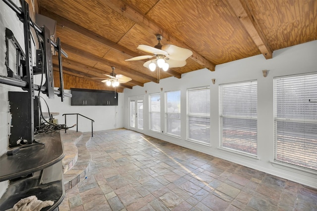 unfurnished sunroom featuring vaulted ceiling with beams, wooden ceiling, and ceiling fan