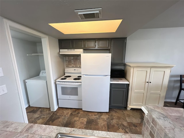 kitchen featuring white appliances, washer / clothes dryer, and gray cabinetry