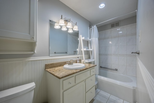 full bathroom featuring tile patterned flooring, vanity, shower / bathtub combination with curtain, and toilet