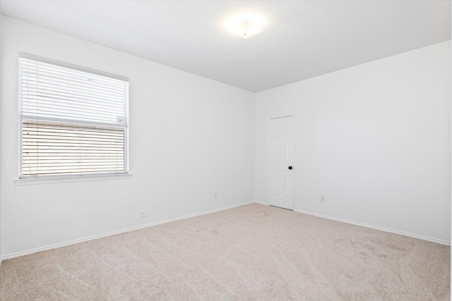 empty room with light carpet