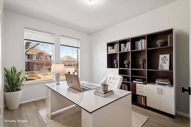 office area featuring light hardwood / wood-style flooring